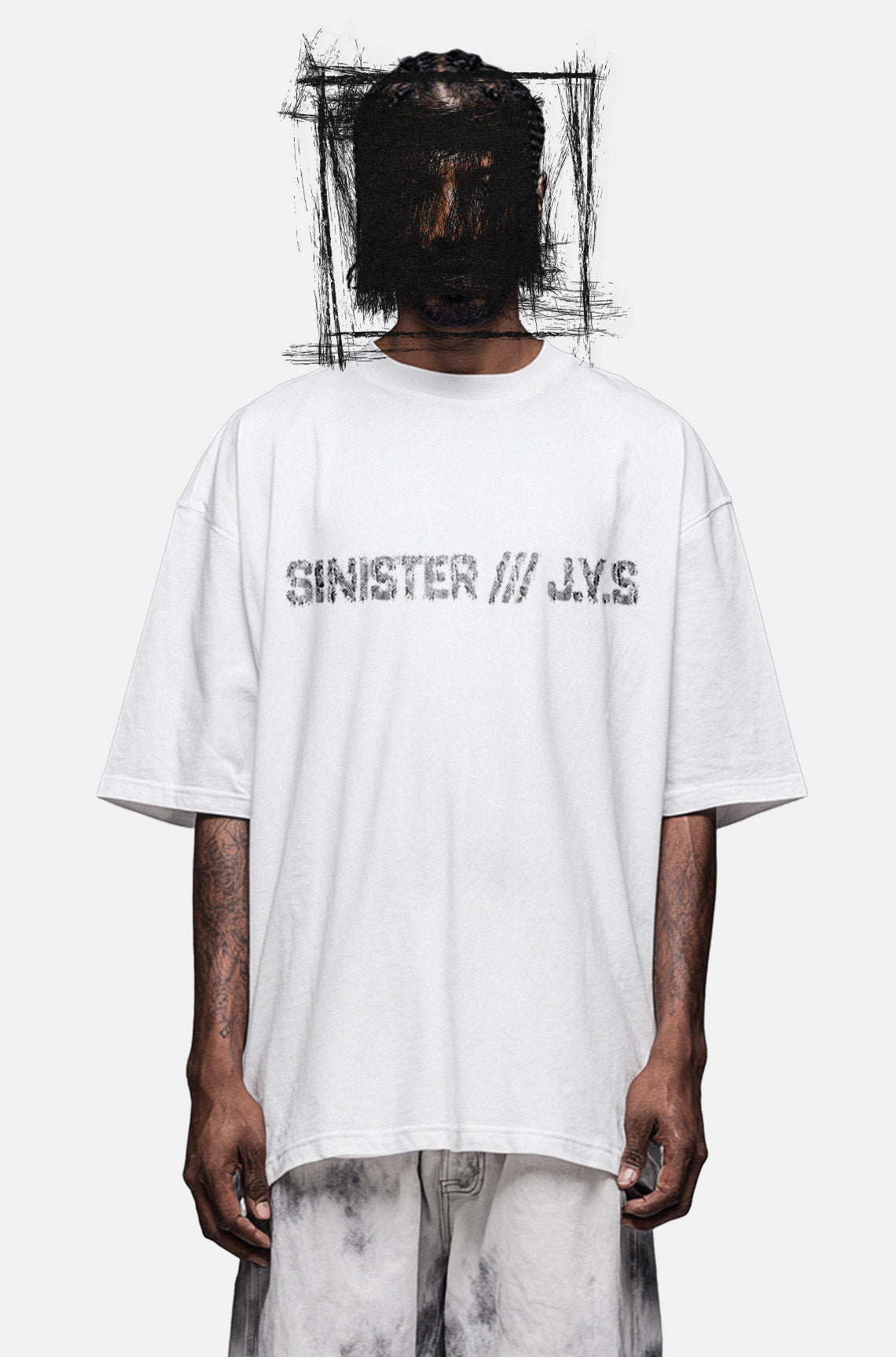 Person wearing a white t-shirt with 'Sinister J.Y.S.' text on a white background