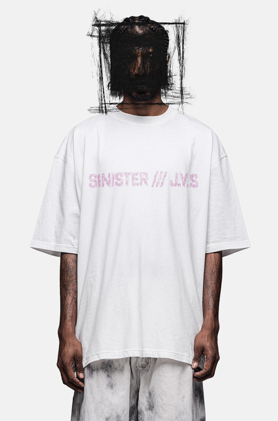 Person wearing a white t-shirt with pink text on a white background